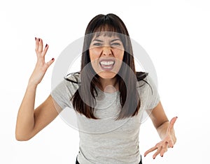 Desperate young attractive woman with angry face looking furious. Human expressions and emotions