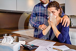 Desperate young woman with debts reviewing the