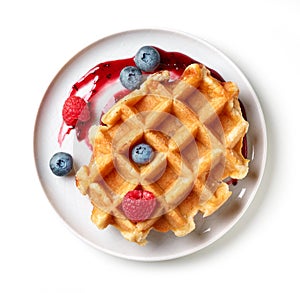 Dessert of belgian waffle and fresh berries