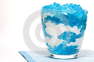 Dessert blue jelly in bowl with whipped cream