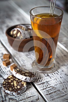 Dessert of cookies, chocolate, coffee with tea