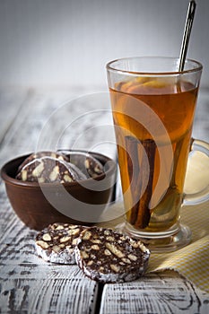 Dessert of cookies, chocolate, coffee with tea