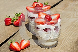 Dessert with cream and fresh strawberries