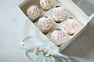 Dessert cupcakes in a gift box. place for inscription