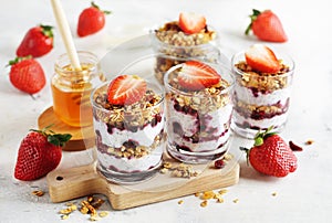 Dessert of homemade muesli, berries and yogurt