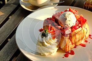 Dessert honey toast with ice cream and strawberry for romantic sweet time in valentine`s day