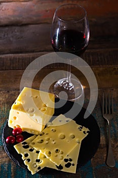 Dessert with medium-hard mild Swiss cheese Emmental and glass re