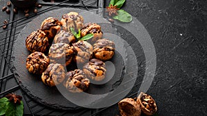 Dessert. Mini eclairs with chocolate. Baking.