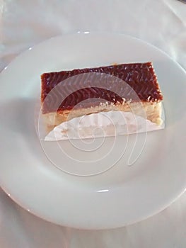 DESSERT OF PASTRY FILLED WITH PASTRY CREAM WITH COVERAGE OF HOJALDRE photo