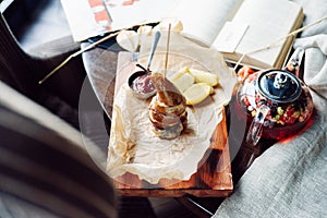 Dessert of pears and cottage cheese on wood