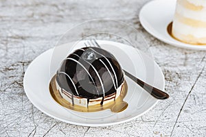 Dessert, small dark chocolate cake