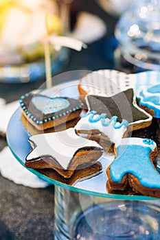 Dessert Sweet Cookies in shape of a star and a boot in Candy Bar