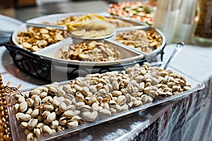 Dessert table of delicious snacks on wedding reception