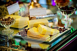 Dessert table for a party. Candy bar and cheese bar. Rich thematic wedding candy bar high variety of sweets