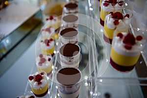 Dessert table for a party Candy bar. Rich thematic wedding candy bar, high variety of sweets