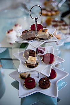 Dessert table for a party Candy bar. Rich thematic wedding candy bar, high variety of sweets