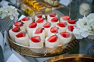 Dessert table for a party Candy bar. Rich thematic wedding candy bar, high variety of sweets