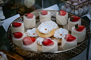 Dessert table for a party Candy bar. Rich thematic wedding candy bar, high variety of sweets