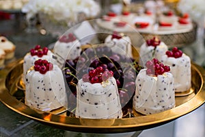 Dessert table for a party Candy bar. Rich thematic wedding candy bar, high variety of sweets