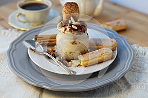 Dessert tiramisu in a glass jar