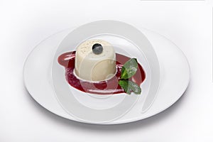 Dessert on a white plate.Cake decorated with fruits.