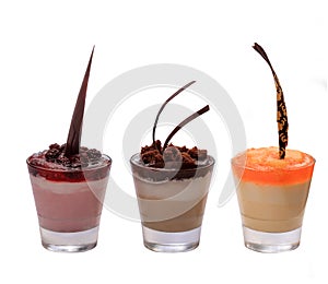 Desserts in a glass on the white background