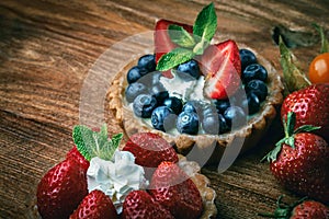 Desserts on wooden table photo