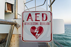 Destin, Florida- AED Automated External Defibrillator signage on a pier