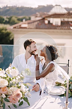 Destination fine-art wedding in Florence, Italy. Multiethnic wedding couple. African-American bride and Caucasian groom