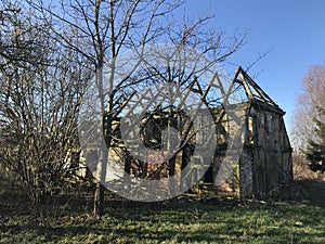 Destroed old house in Polish village in early spring