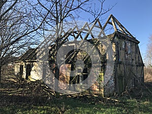 Destroed old house in Polish village in early spring