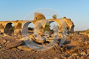 Destroyed abandoned Ajuda bridge crossing the Guadiana river