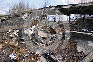 Destroyed abandoned building ruins. Farm hangar destroyed by weather after economic crisis