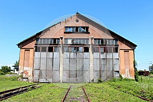 Destroyed abandoned railway station train repair workshop building