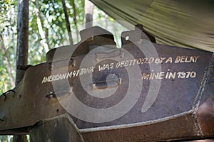 The destroyed American tank in the Cu Chi tunnel in South Vietnam