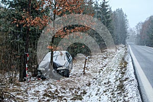 Destroyed car standing by the road