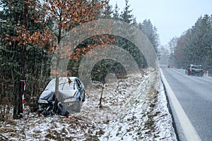 Destroyed car standing by the road