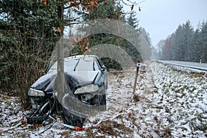 Destroyed car standing by the road