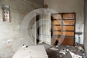 Destroyed desk and book shelf in the principla's office