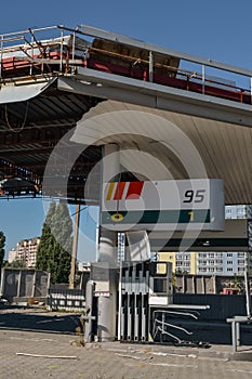 destroyed gas station from hostilities