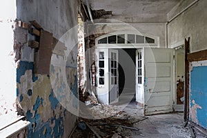 Destroyed house. Inside an old abandoned building