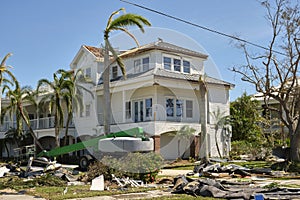 Destroyed by hurricane Ian expensive house in Florida residential area. Consequences of natural disaster