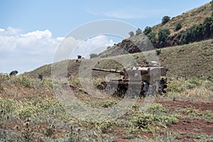 Destroyed Israeli tank is after the Doomsday Yom Kippur War on the Golan Heights in Israel, near the border with Syria