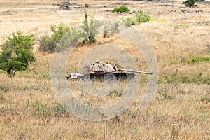 Destroyed  Israeli tank is after the Doomsday Yom Kippur War on the Golan Heights in Israel, near the border with Syria