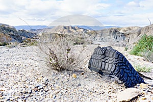 Destroyed rubber car tire on nature