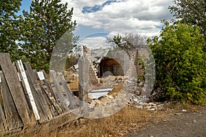 Destroyed by vandals and looted garden houses