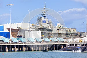 Destroyer under construction in a naval shipyard photo