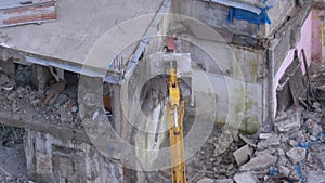 Destroying Old House Using Bucket Excavator on Construction Site.