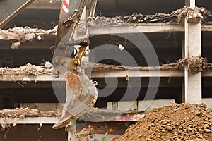 Destruction of concrete building with equipment