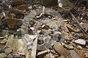The destruction of old house with rubble